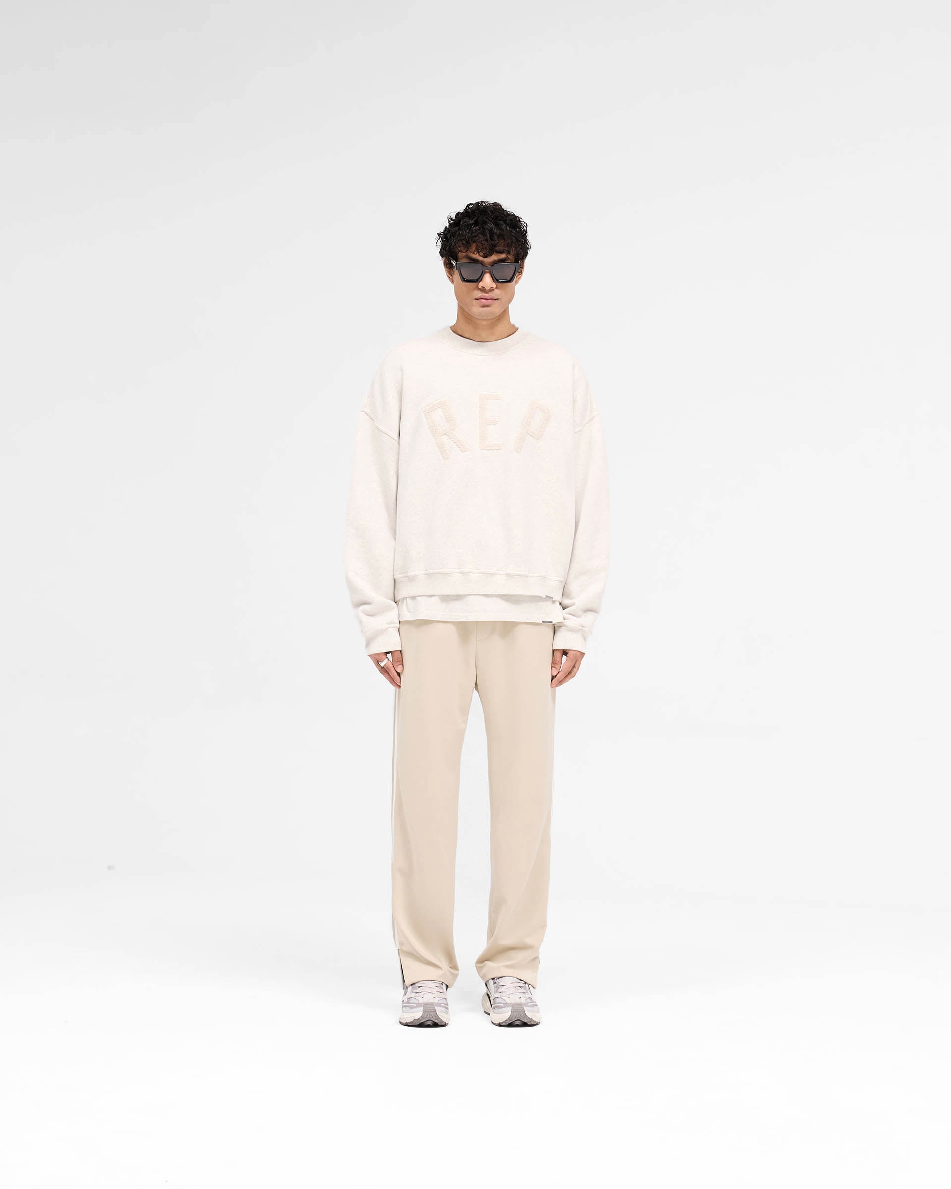 Rep Applique Sweater - Cream Marl